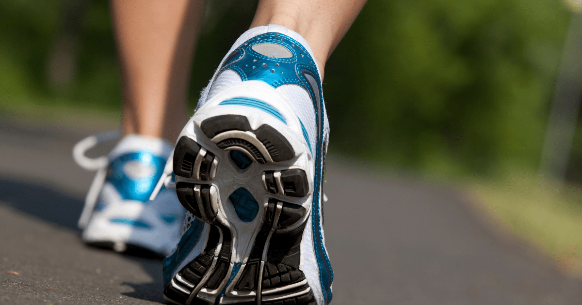 Walking with shoes on pavement